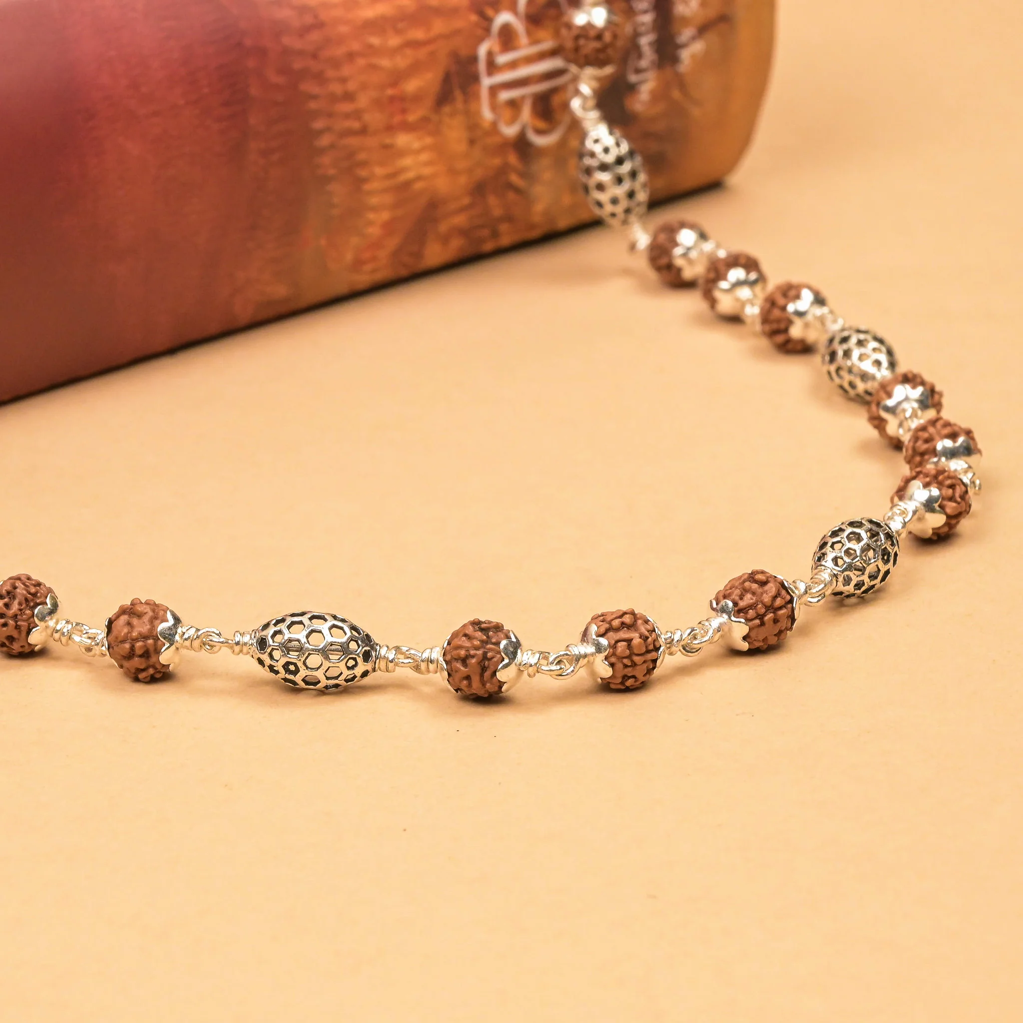 Rudraksha With Perforated Oval Silver Beads Mala