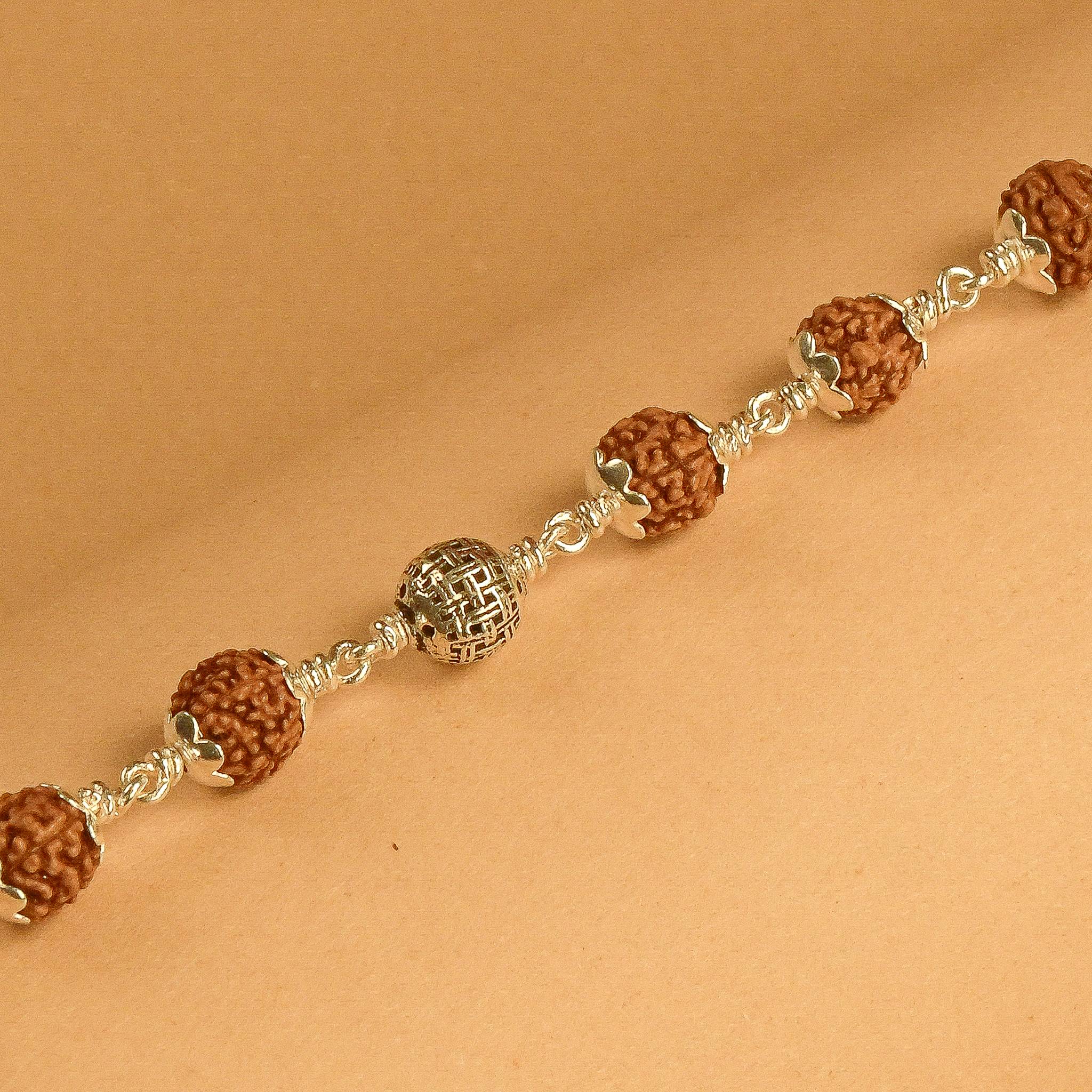 Rudraksha With Silver Heavy Beads Bracelet.