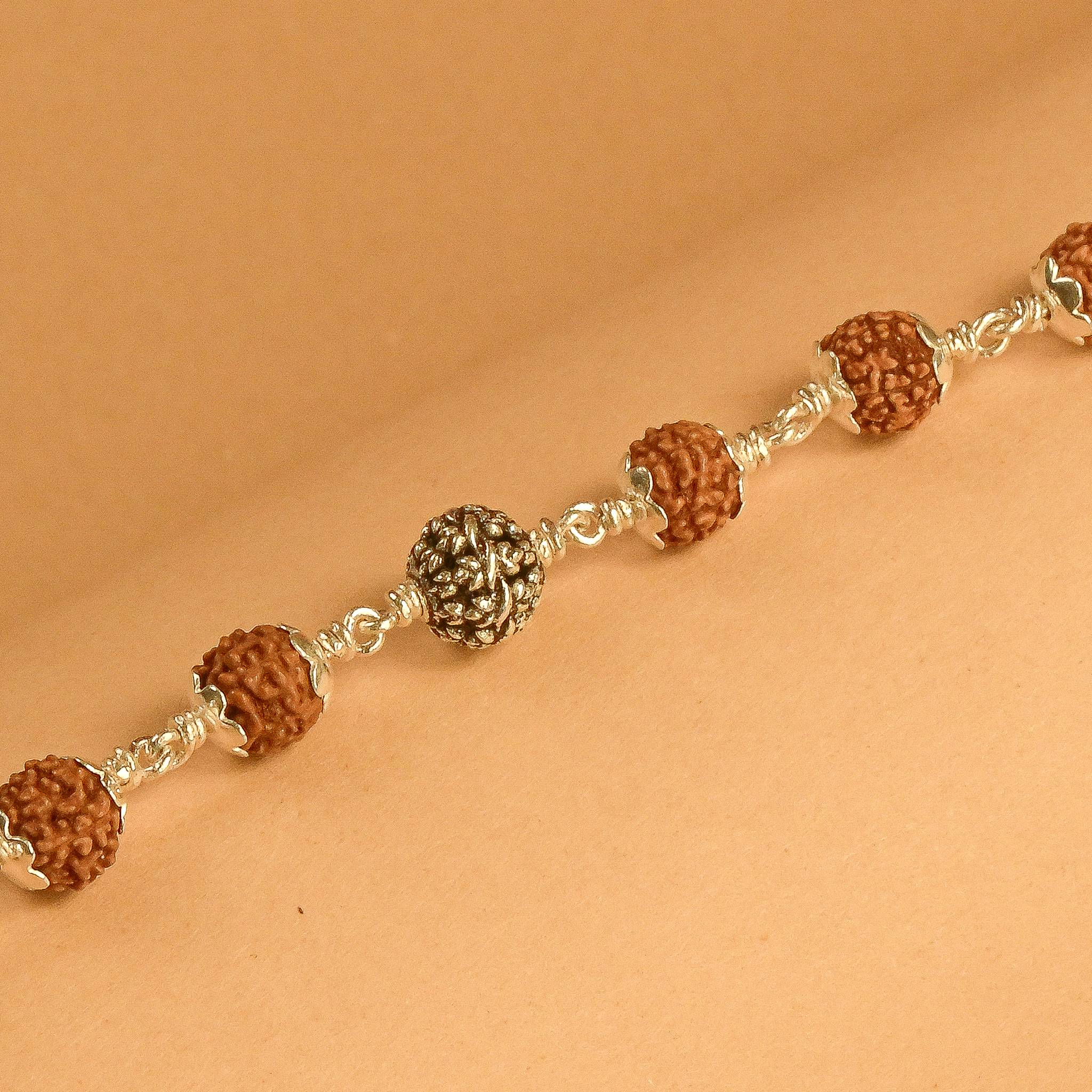 Rudraksha With Silver Flower Beads Bracelet