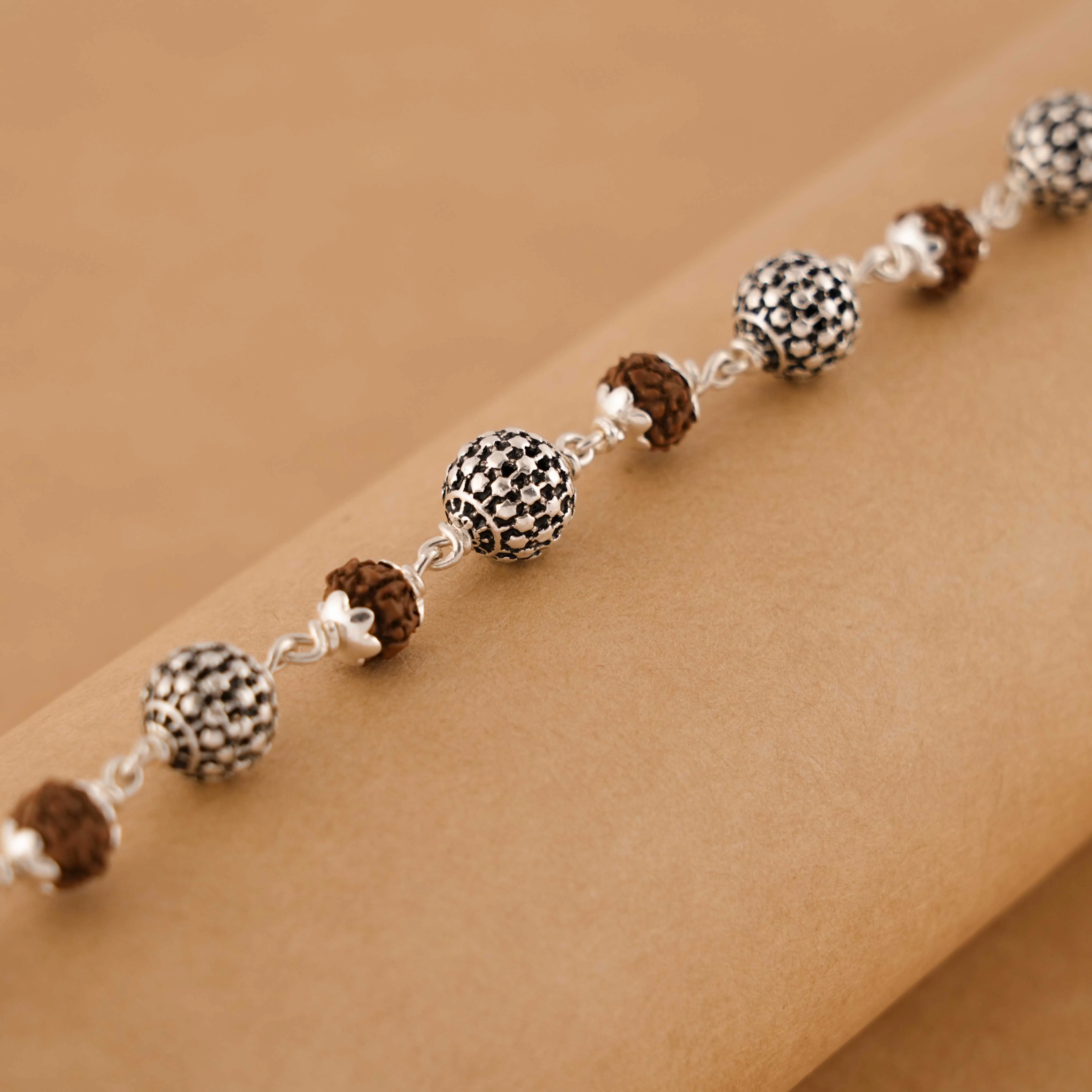 Rudraksha Silver Hollow Round Beads Bracelet.