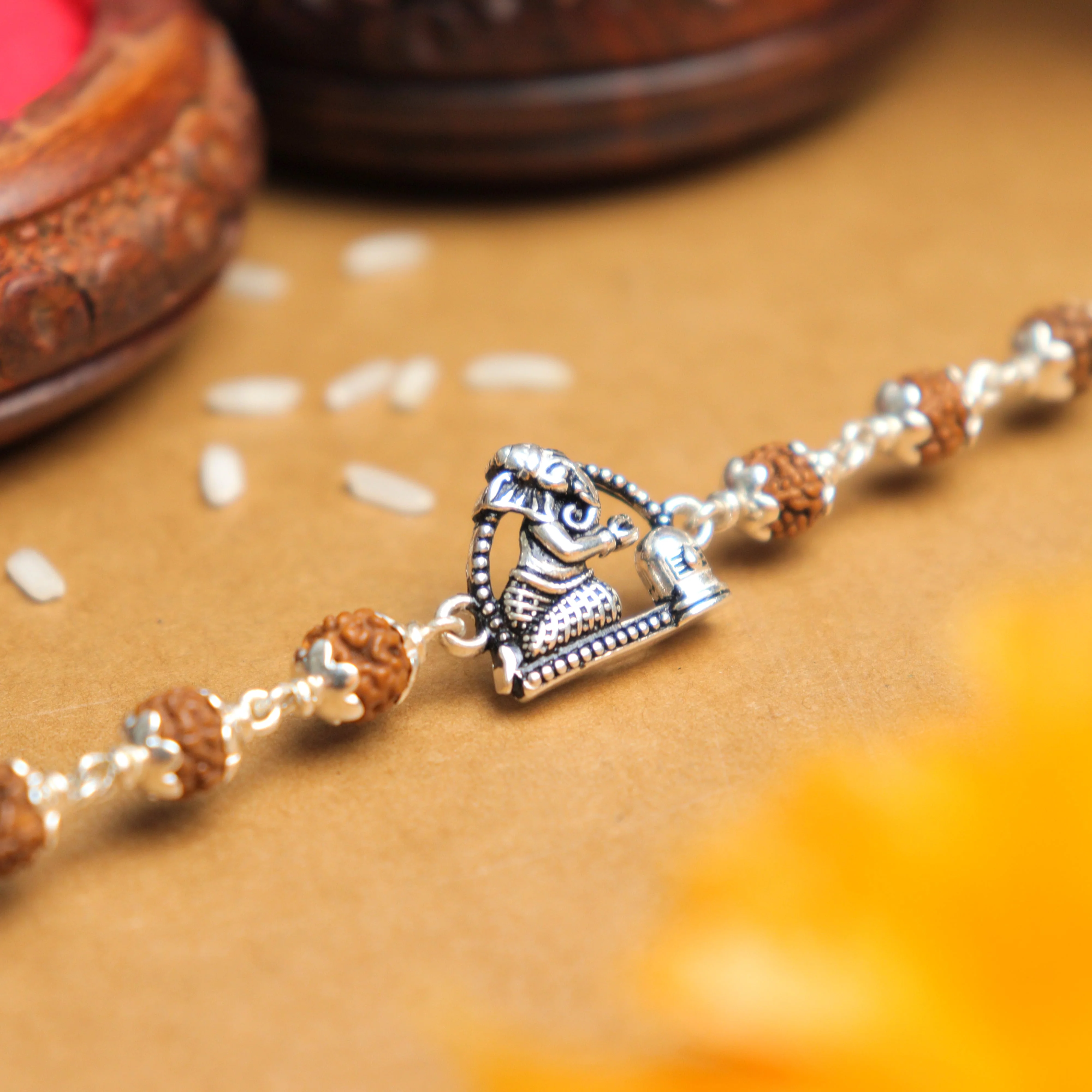 Silver Rakhi with Folded-Hand Ganesh