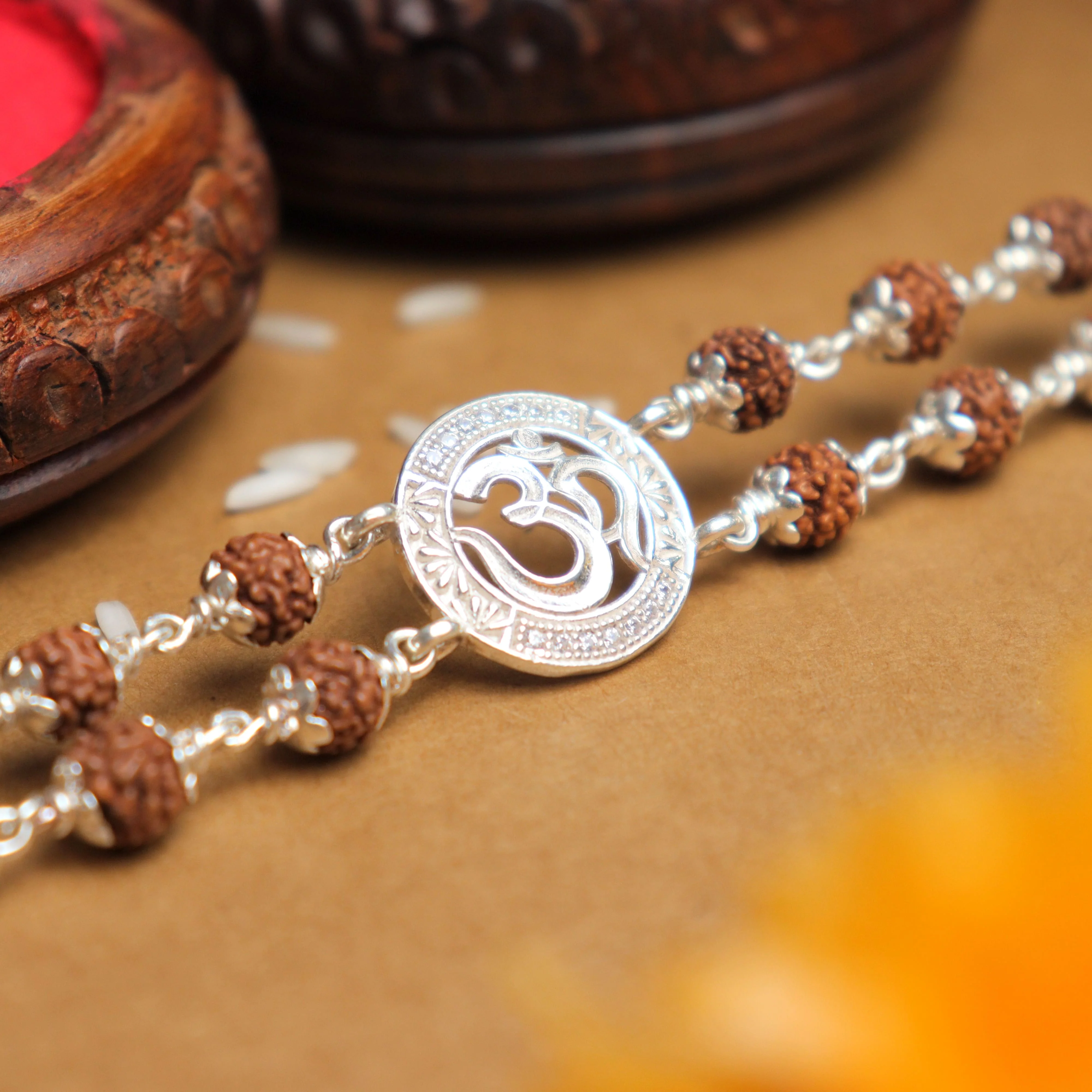 Silver Rakhi with Rudraksha and Om in the Middle, Double Line Design