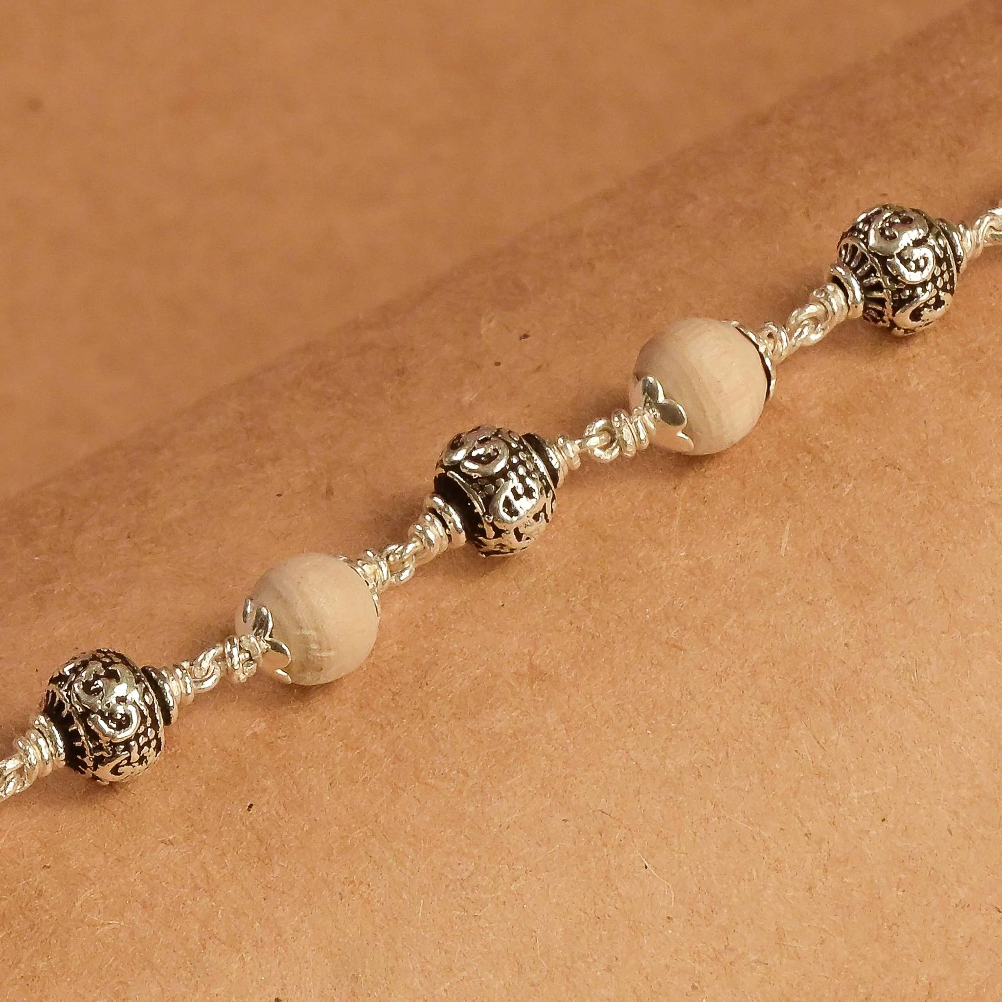 Tulsi Silver Om Beads Bracelet